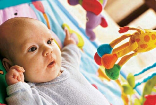 Toys and a mentally stimulating environment help a baby’s brain grow complex neural connections.